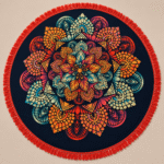 Manta Coral decorativa con diseño mandala y flecos